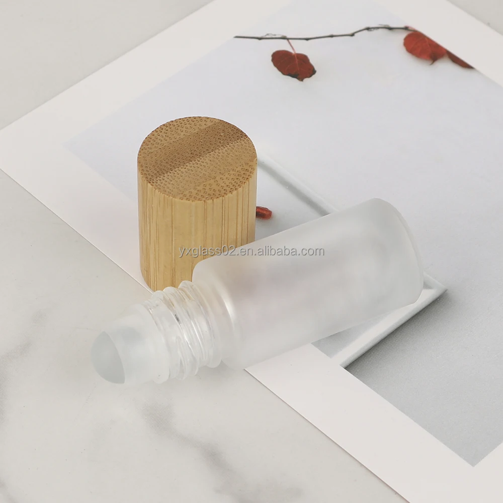 Roll On glass Bottle 5ml 10ml essential oil roller bottles skincare cosmetic packaging glass bottle with bamboo wooden cap supplier