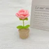Producto terminado: Rosa rosa en maceta.