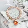 Bracciale margherita rosa arancione
