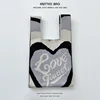 Cuore gradiente nero e grigio