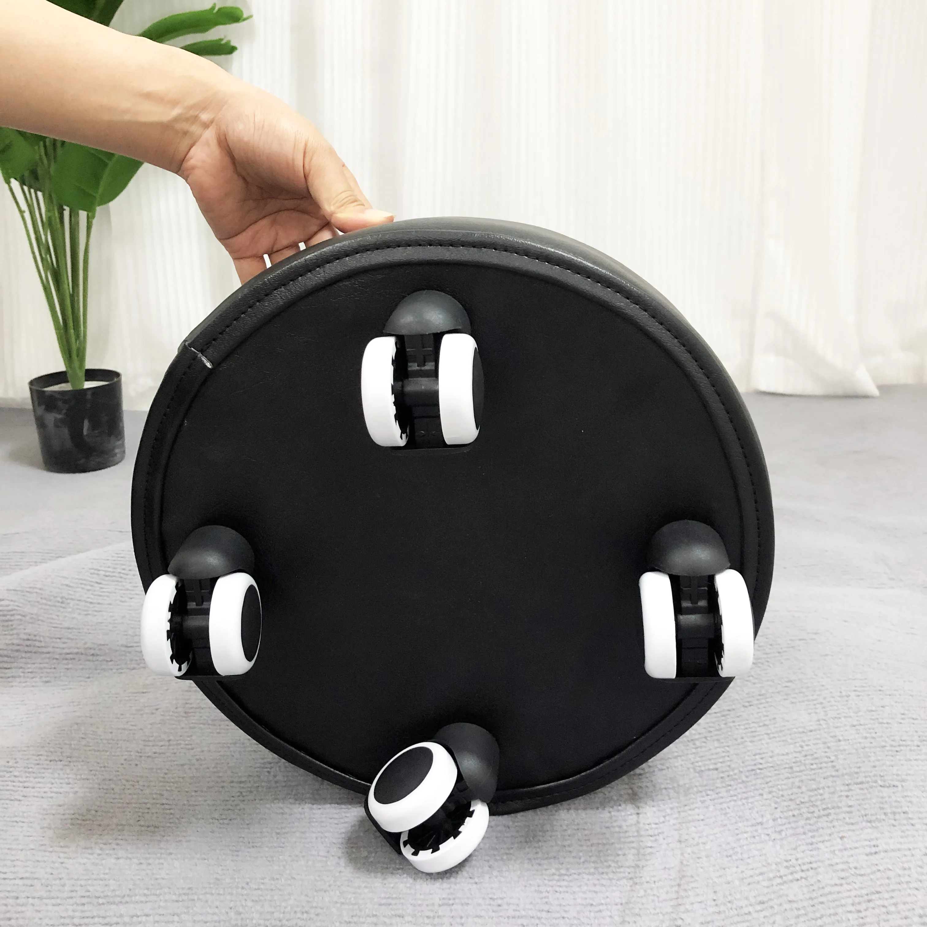 small round rolling low stool salon