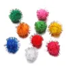 Pompones de hilo dorado de 1 cm.