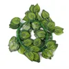 Simulated watermelon rind and pepper leaves