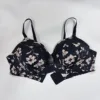 Black background with printed pink flowers