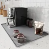 Grey coffee machine mat
