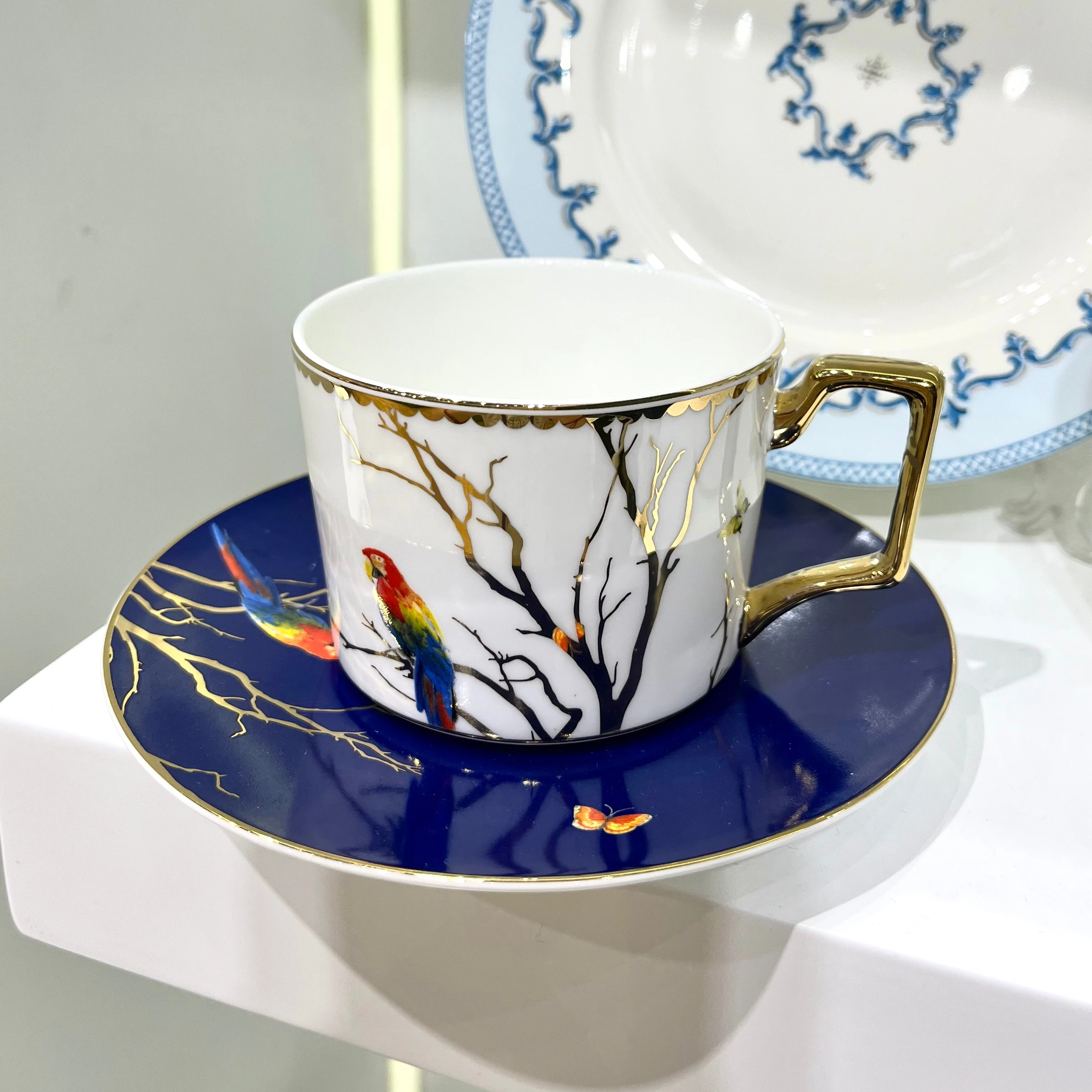 Luxury parrot pattern ceramic fine bone china household business gift 220ml cup and saucer