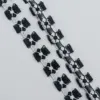 Black flowers on white background [1cm*10 yards]