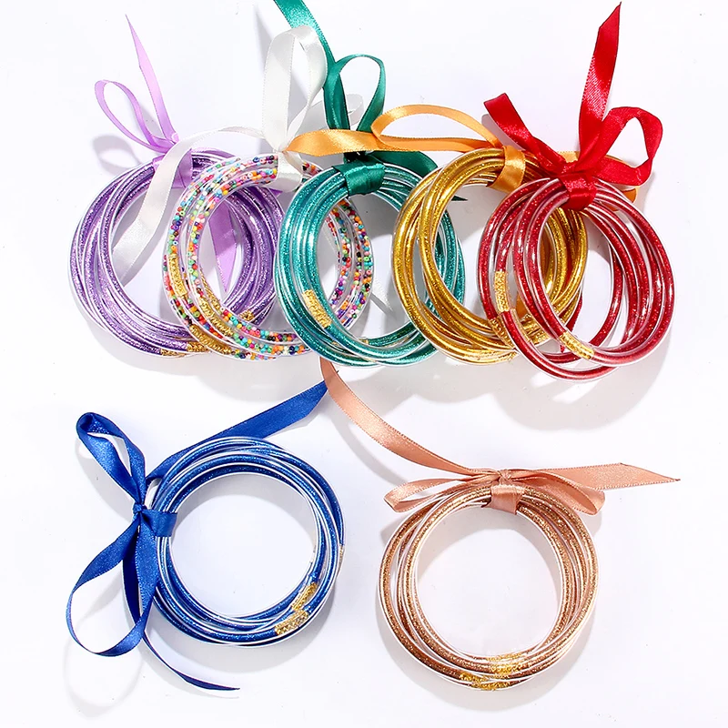 Amazon.com: LIFKOME 60 Pcs Glitter Jelly Bracelets Set for Women Jelly  Bangle Bracelets Glitter Filled Silicone Bracelet Colorful Sparkling Jelly  Bangle Bracelet with Ribbon Bow for Party: Clothing, Shoes & Jewelry