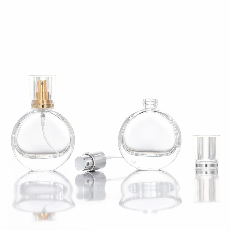 STOCK Elegant 25ml Oval Shape Clear Glass Perfume Bottle Refillable Pump Atomizer Bottle with Sprayer and Clear Caps