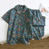 Set pantaloni a maniche corte con fiori blu