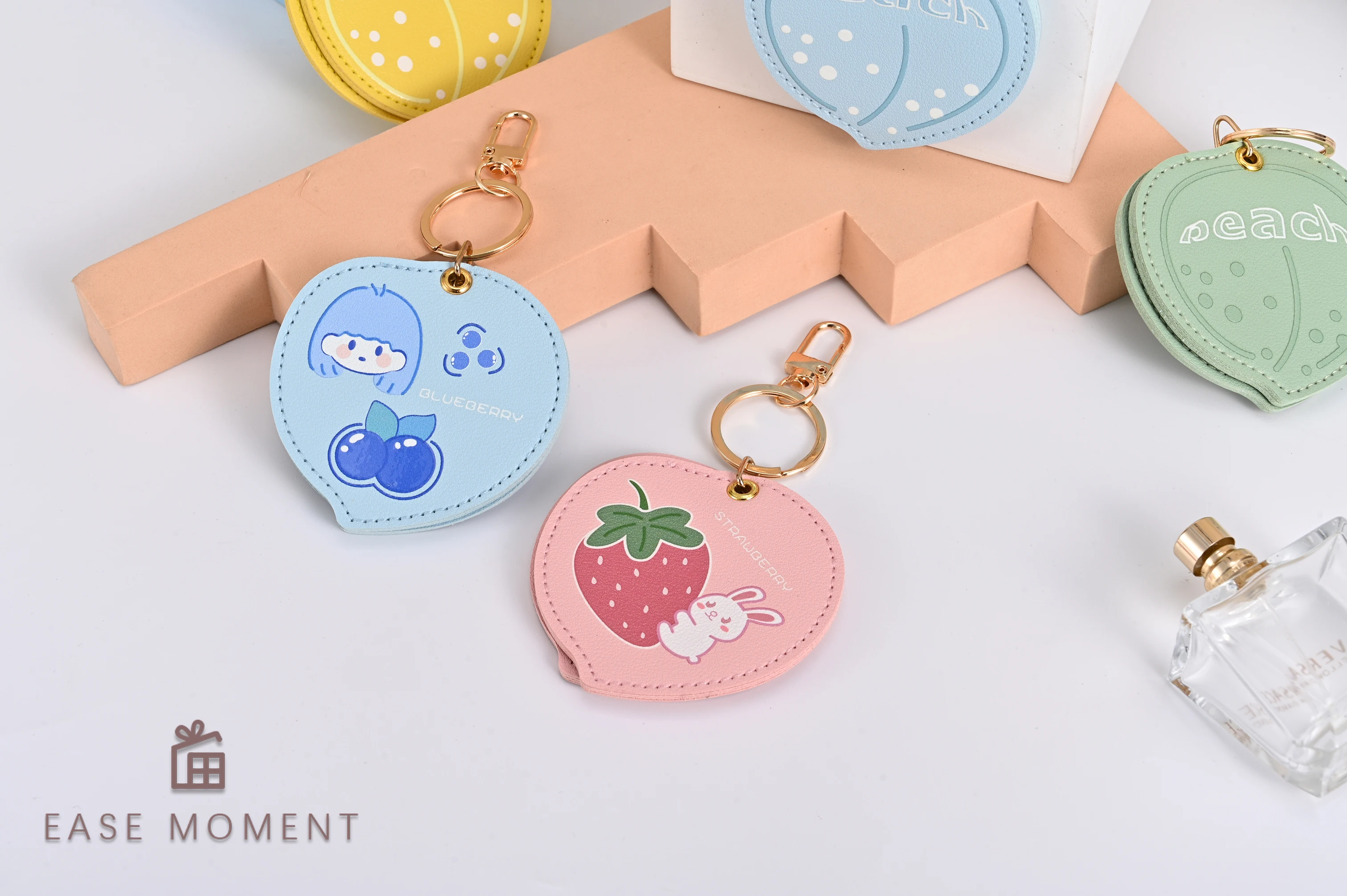 Newly Launched Gold Keychain Multi-color Leather case with Peach Shaped Cute Birthday Gift Hanging Bag and Makeup Mirror (1PC)