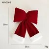 Burgundy bow with white edges (medium size)