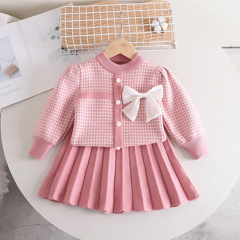 2023 Girls Designer New Solid Sweater Plaid Pleated Skirt Autumn Winter Bow Knitting Two Pieces Long Bubble Sleeves Kids Wear