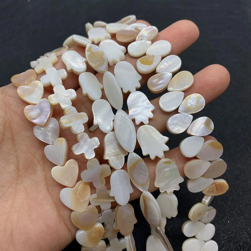 New Design Cross Shape Natural Sea Shell Beads Wholesale Fancy Mother of  Shell Pearl Beads for Jewelry Making