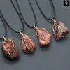 Agata rossa (dorata con corda di cuoio)