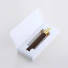 frosted amber bottle + gold sprayer + white box