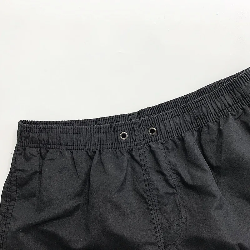 Low MOQ Custom Summer Elastic Waist Mens Swim Shorts 100% Polyester Swim Trunks Mesh Beach Shorts For Men276_voghion.com