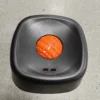Black bowl orange ball