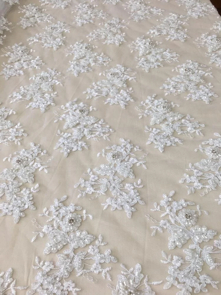 
Роскошная белая вышитая кружевная Тюлевая ткань для невесты с тяжелыми ручными бусинами и блестками кружевная ткань со стразами для свадебного платья 