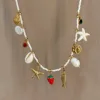 Collier fini fraise