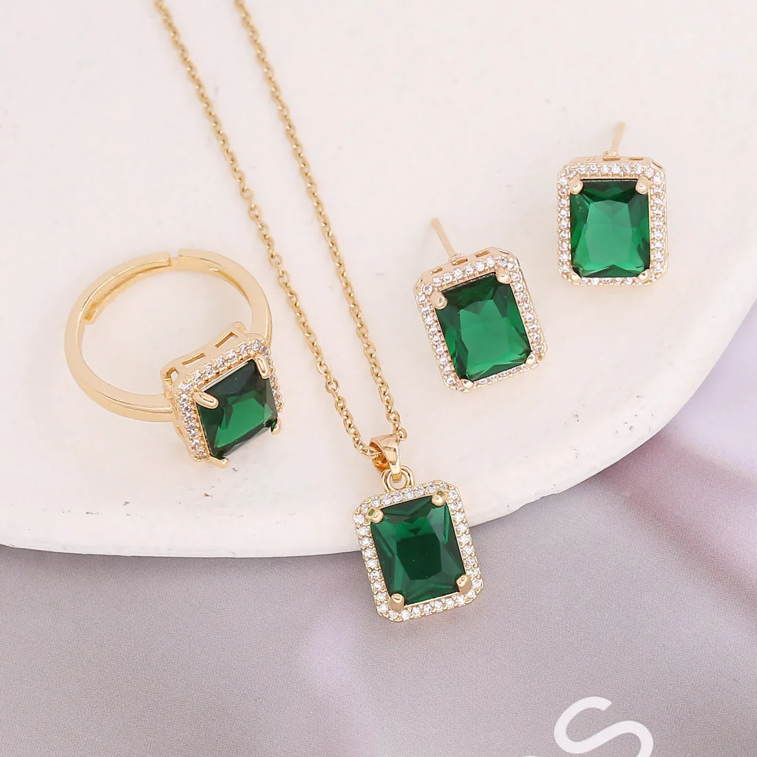 emerald earrings and pendant set