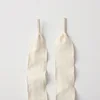 Beige lotus leaf shoelaces