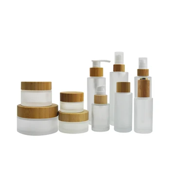 frosted skincare packaging pump bottle set bamboo lid body butter lotion serum cream glass cosmetic jar