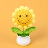 Mini planta en maceta de girasol con cara sonriente de 7 círculos, amarillo