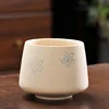 Tazza generale color caffè con motivo di fiori di ciliegio