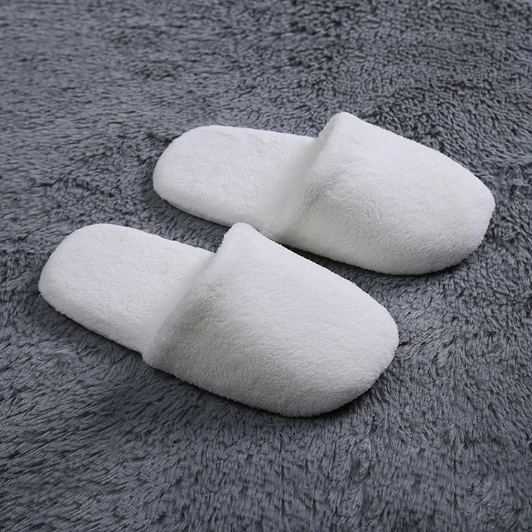 Cheap Wholesale Airline Spa Luxury slippers Unisex Disposable Soft Comfortable Slippers for Hotel Room factory