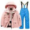 Cappotto rosa + pantaloni blu