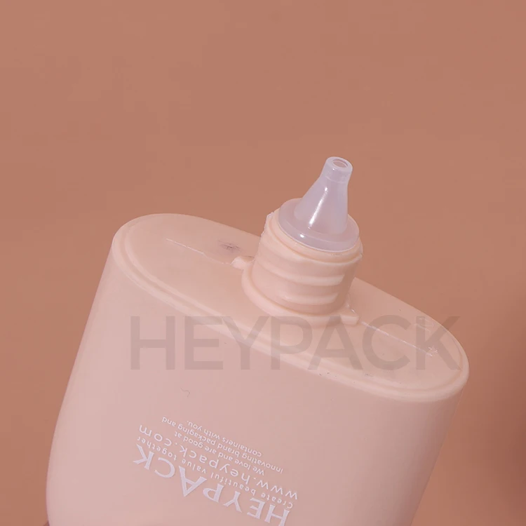 Flat Oval Shape 40ml HDPE Nozzle Applicator Sunscreen Lotion Bottle