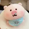 Oso autocrítico [Cerdo gordo con bufanda azul]