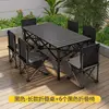 Mesa de 95cm de largo en color negro y plateado con 6 sillas plegables de 36cm