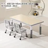 A table and two chairs in wood grain gray.