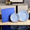 Juego de platos azules