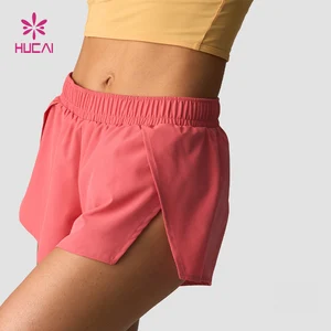 HUCAI Custom Sportswear Breathable Lightweight Drawstring High Split Hem Dry Fit Workout Gym Running Shorts Women
