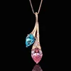 Colgante de diamante rosa y aguamarina con cadena.