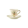 Cup with saucer