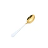 gold white dinner spoon