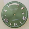 Logotipo 31mm-s - verde oliva con tachuelas plateadas