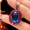 Blue pointed crystal pendant with box chain