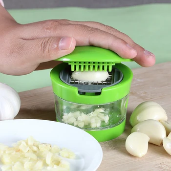 Kitchen Innovations Garlic-A-Peel Garlic Press, Crusher, Cutter, Mincer,  and Storage Container - Includes Silicone Garlic Peeler - Easy to Clean 