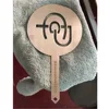 100mm diameter, long handle with logo