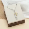 Collana in argento con ciondolo madre e figlio