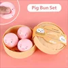 Lot de 3 petits pains roses en forme de cochon + cuiseur vapeur