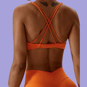 Nude Feel Quick Dry Yoga Bra Shockproof Breathable Front Twist Removable Chest Pad Sexy Hollow Backless Gym Top for Workout