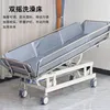Cama de ducha elevable con superficie de acero inoxidable y estructura de acero al carbono