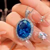 Platinum Blue pointed crystal pendant with chain