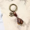 1693 ciondolo a forma di frutto Markley incluso